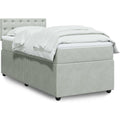 Ein Lattenrost und einen Taschenfederkern an dem Boxspringbett