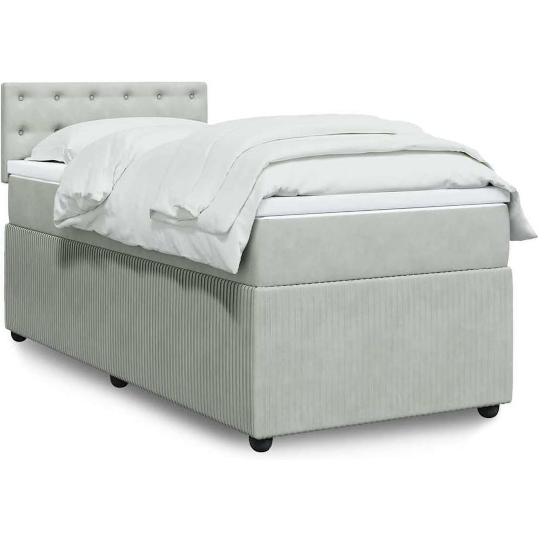 Ein Lattenrost und einen Taschenfederkern an dem Boxspringbett